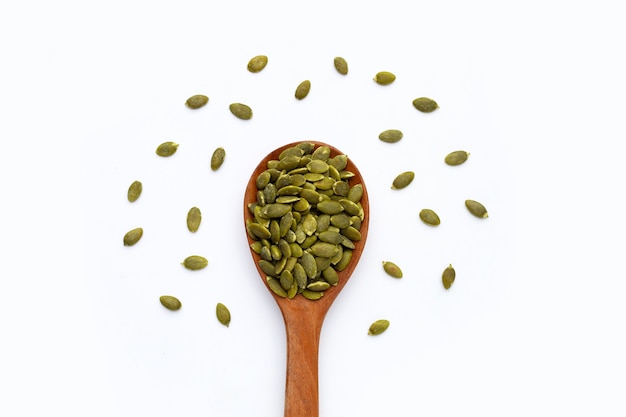 Pumpkin seeds on a white background