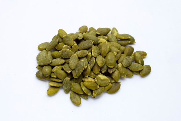 Pumpkin seeds on a white background