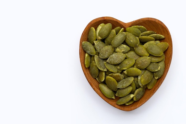 Pumpkin seeds on a white background