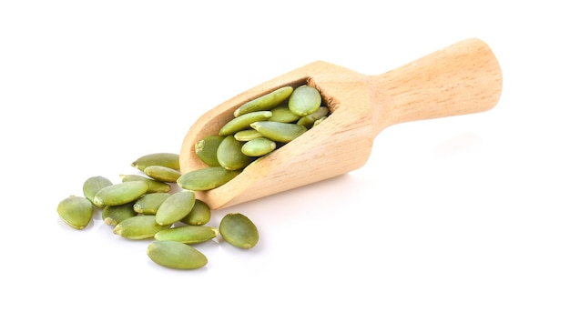 Pumpkin seeds on white background