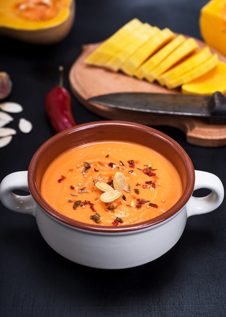 Pumpkin soup in a ceramic plate 