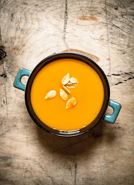 Photo pumpkin soup. cooked soup from a ripe pumpkin.