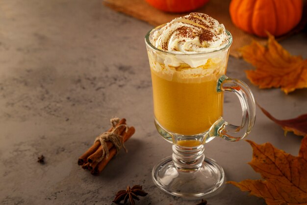 Pumpkin spice latte with whipped cream.