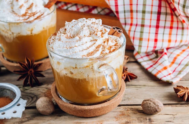 Pumpkin spiced latte on a vintage table