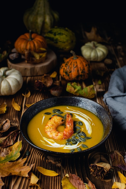 Pumpkin squash soup with seeds and olive oil