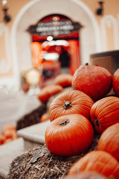 Pumpkins for sale at an outdoor market in autumn season