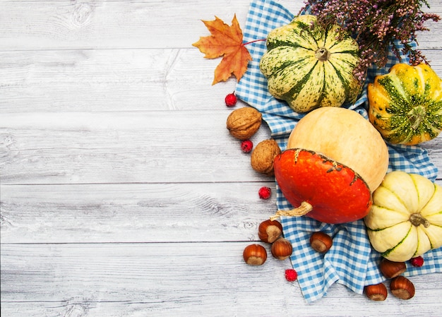 Pumpkins with autumn leaves