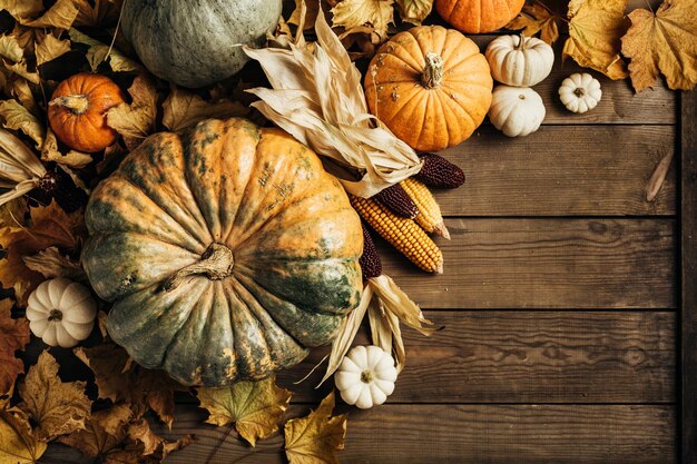 Pumpkins on a wooden background