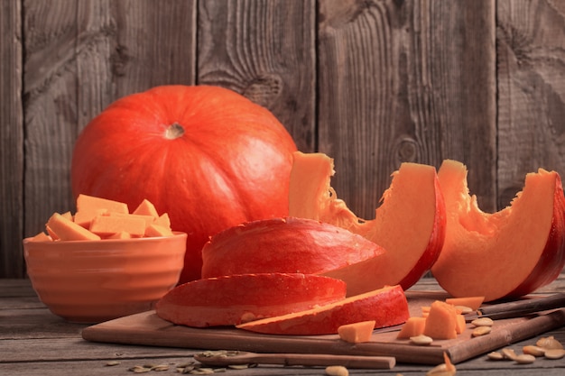 Pumpkins on wooden board