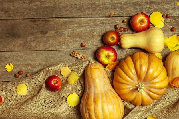 Pumpkins on wooden board