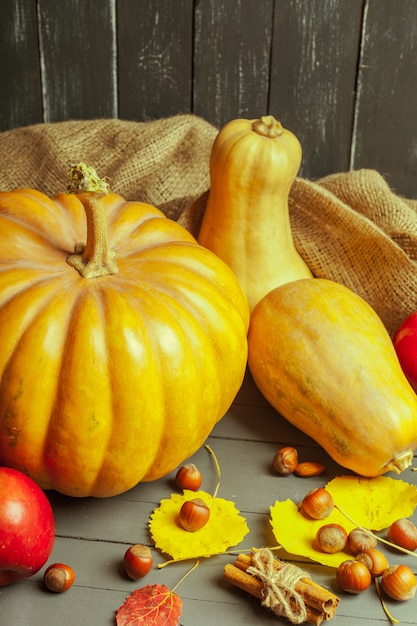 Pumpkins on wooden board