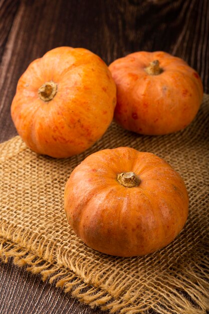 Pumpkins on the wooden table