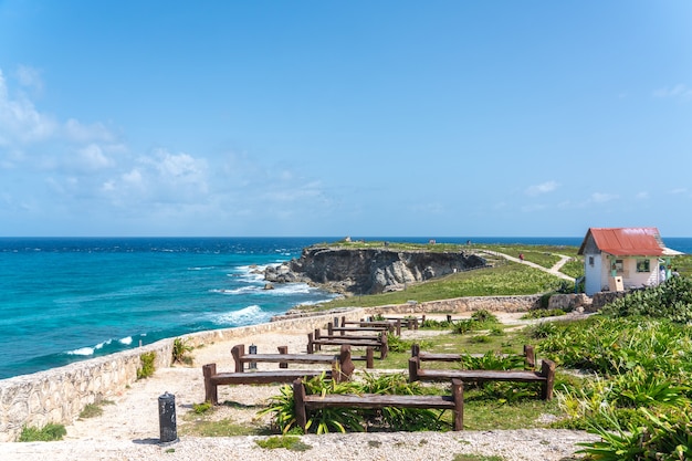 Punta sur  southernmost point of isla mujeres mexico beach with rocks on caribbean sea