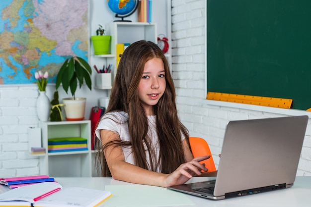 Pupil kid study at school in workplace classroom learning