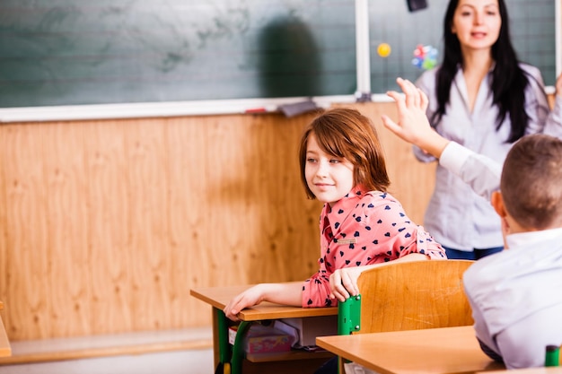 Pupils look back during the lesson in the classroom