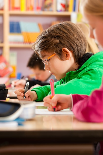 Pupils at school doing homework