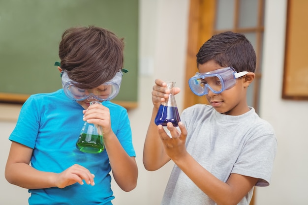 Pupils at science lesson in classroom