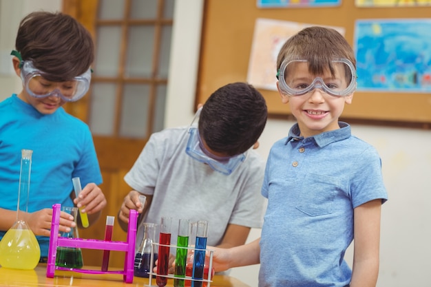 Pupils at science lesson in classroom