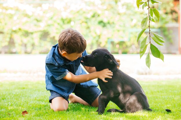 Puppy giving all its love to the young owner