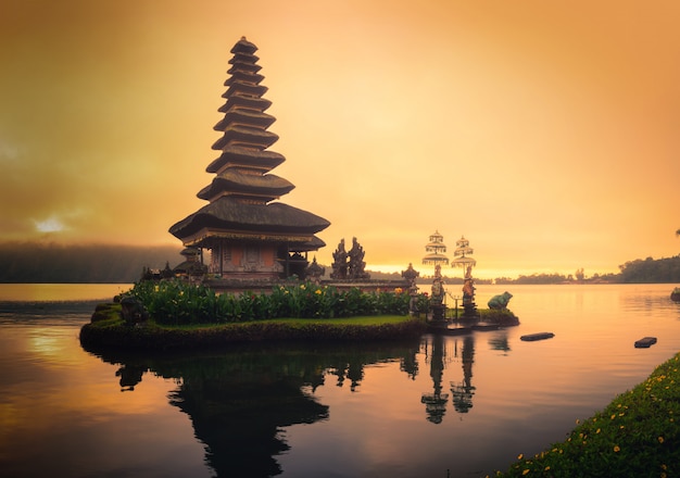 Pura Ulun Danu Bratan, Hindu temple on Bratan lake landscape at sunrise in Bali, Indonesia.