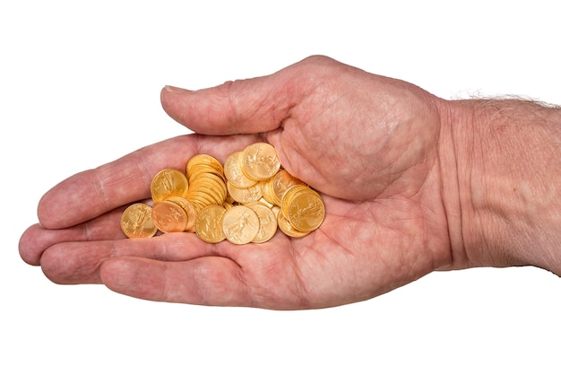 Photo pure gold tenth ounce coins in senior man hand