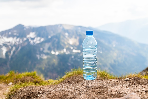 Pure water in plastic bottles on the stone