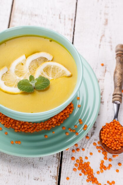  Puree soup with red lentils,with mint and lemon wedges