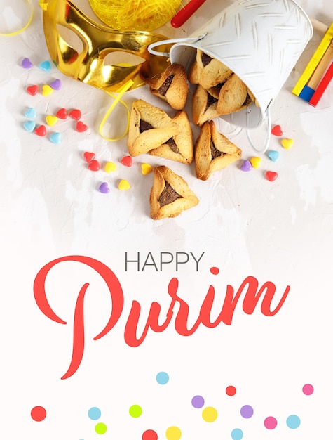 Photo purim festival objects vertical banner with the inscription happy purim