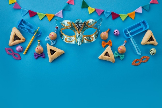 Purim viering concept joods carnaval achtergrond hamantaschen of hamans oren cookies carnaval ma