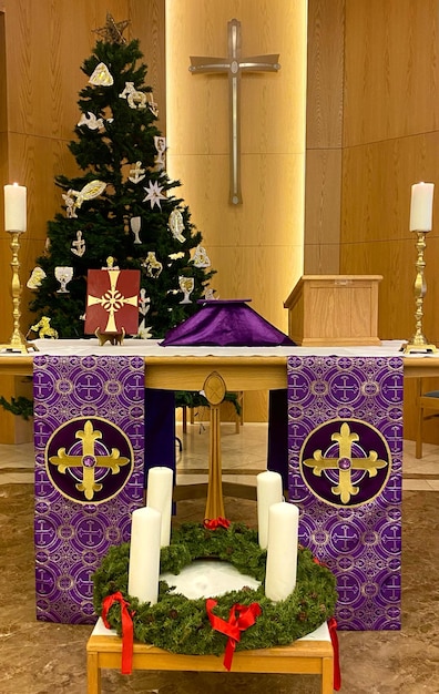 A purple altar with two banners that say