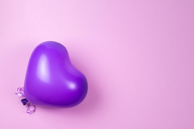 Purple ballon on purple background Copy space