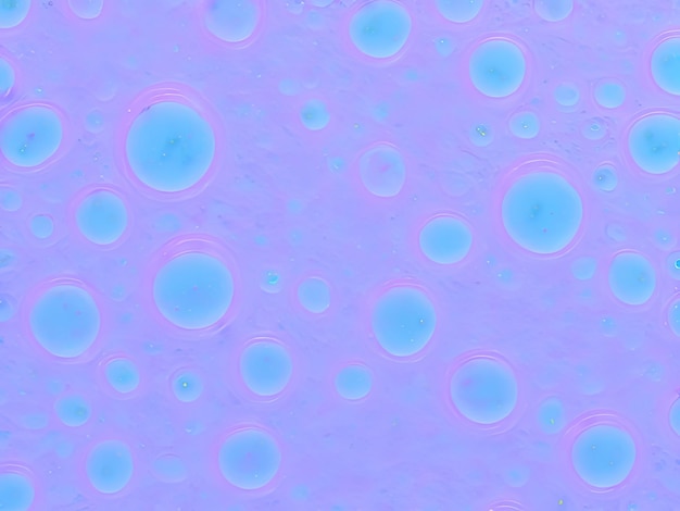 A purple and blue background with bubbles in the middle