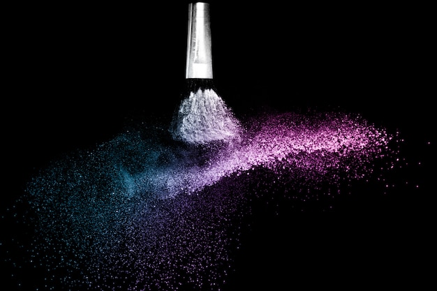 Photo purple and blue ocean cosmetic powder spreading