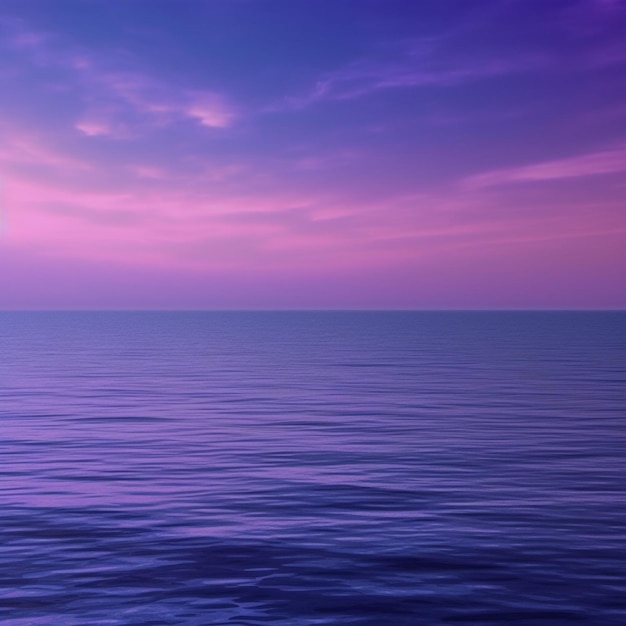 A purple and blue sky with a sunset over the ocean