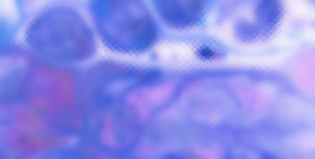 Photo a purple and blue speckled surface with a fish in it