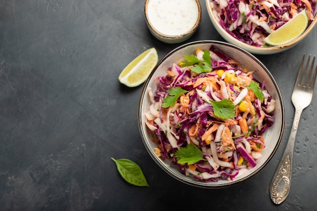 Purple cabbage and carrot salad with mayonnaise.