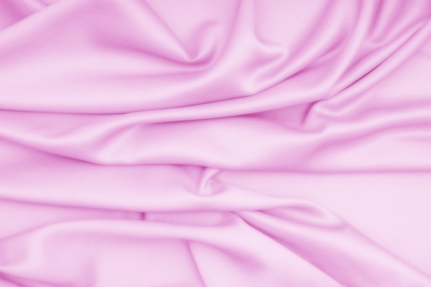 Foto tessuto di seta panno viola con onde morbide