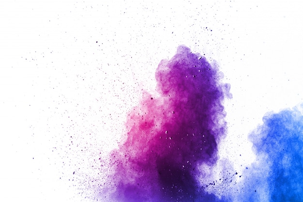 Purple color powder explosion cloud. Closeup of purple dust particles splash on background.