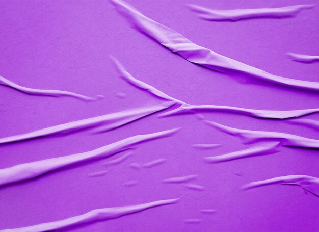 Purple crumped and creased paper poster texture background