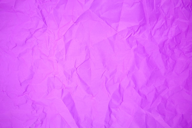 Purple crumpled paper background texture