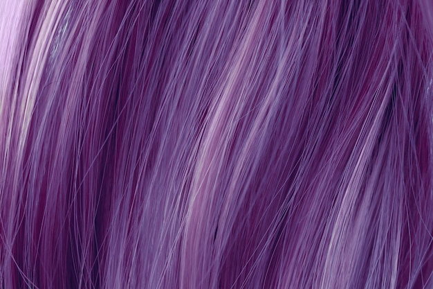 Purple curly hair texture closeup. Toned purple hair background