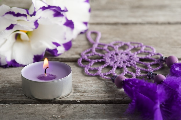 Purple eustoma flowers and dream catcher