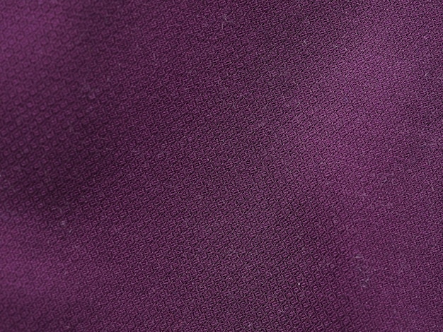 紫の生地のテクスチャ背景