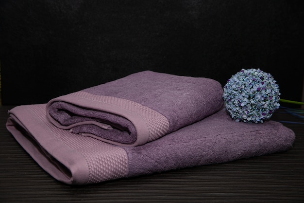 Purple fluffy towels for beauty and SPA salon.