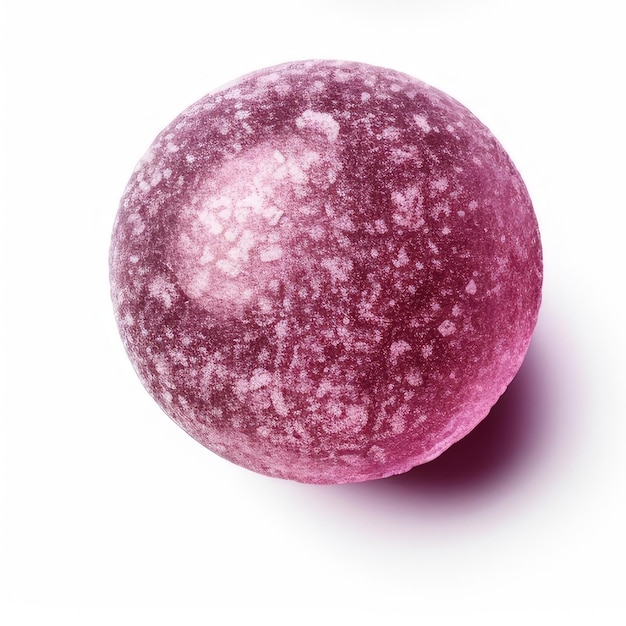 A purple fruit with white spots on it