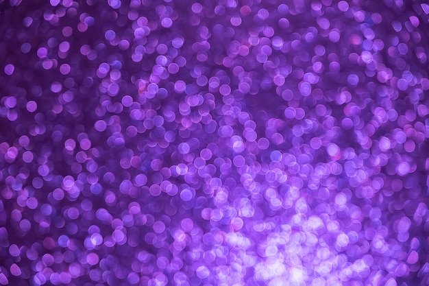 Purple Glitter vintage lights background. Blurred christmas abstract texture. Defocused. 