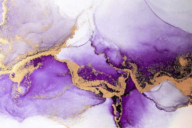 Purple gold abstract background of marble liquid ink art painting on paper .