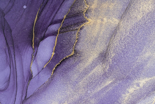 A purple and gold silk scarf with gold stitching.