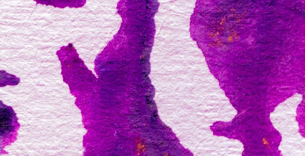Foto una macchia di inchiostro viola su sfondo bianco