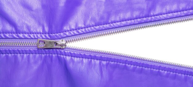 Purple leather texture and open metal zipper isolated on white background